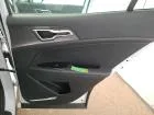 Kia Sportage — Guarnição da porta traseira direita