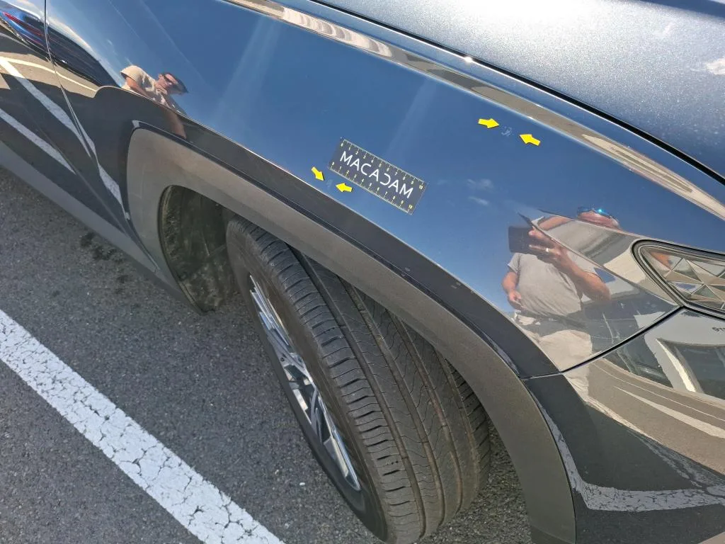 Hyundai Tucson — Guarda-lamas dianteiro direito