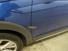Volkswagen Taigo — Guarda-lamas dianteiro esquerdo