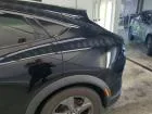 Ford Mustang Mach-E — Guarda-lamas traseiro esquerdo