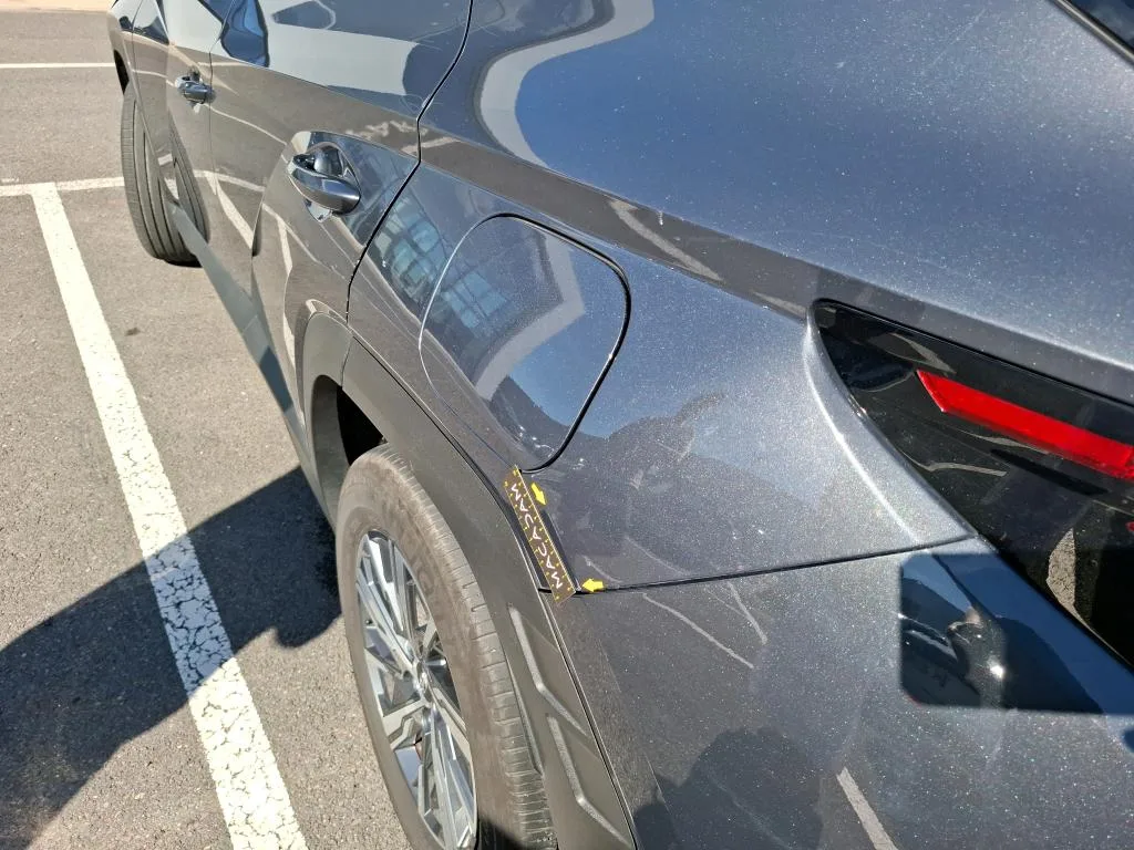 Hyundai Tucson — Guarda-lamas traseiro esquerdo