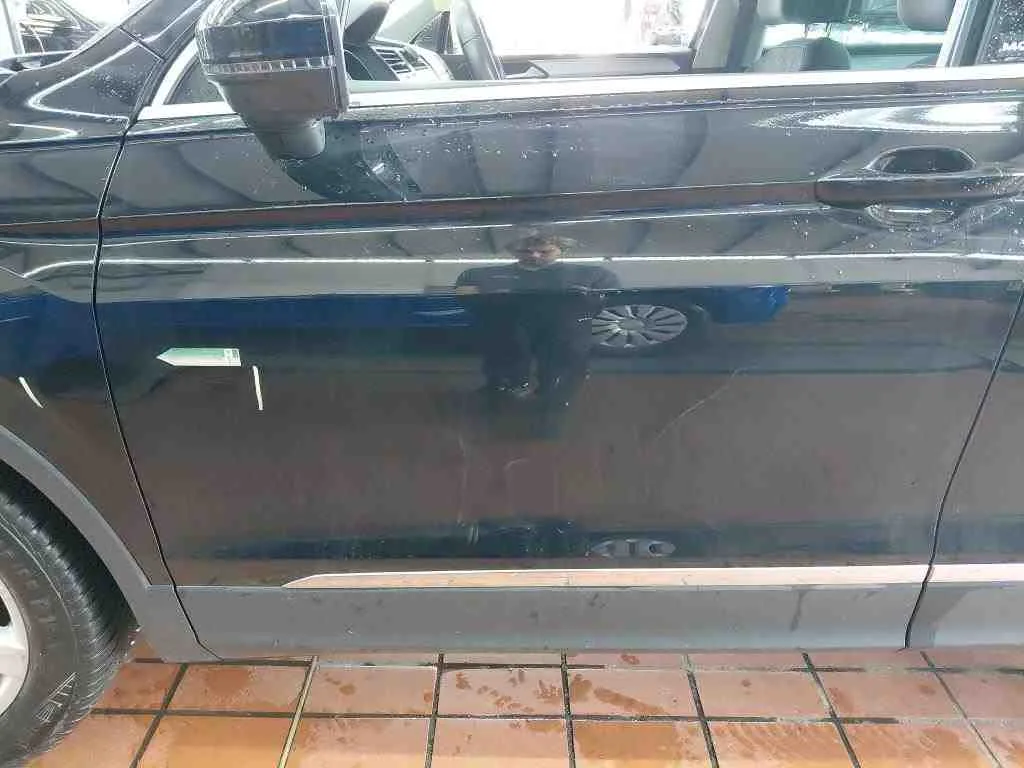 Volkswagen Tiguan — Porta dianteira esquerda