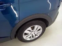Peugeot 5008 — Guarnição do guarda-lamas traseiro esquerdo